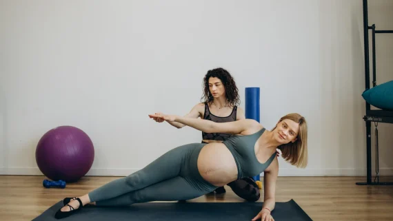 pregnant-woman-pilates-exercise-workout-at-gym-wit-2023-11-27-05-17-51-utc